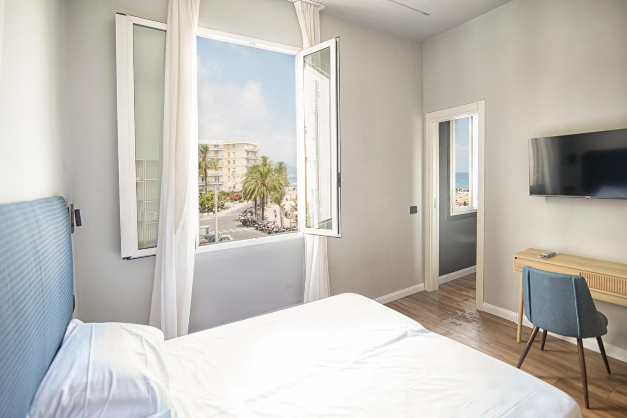 Double or Twin Room with Side Sea View,1550971915:JPEG
