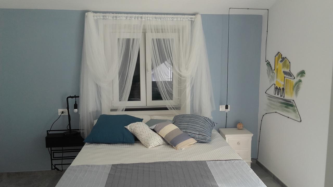 Chambre Double avec Balcon (2 Adultes + 1 Enfant)
